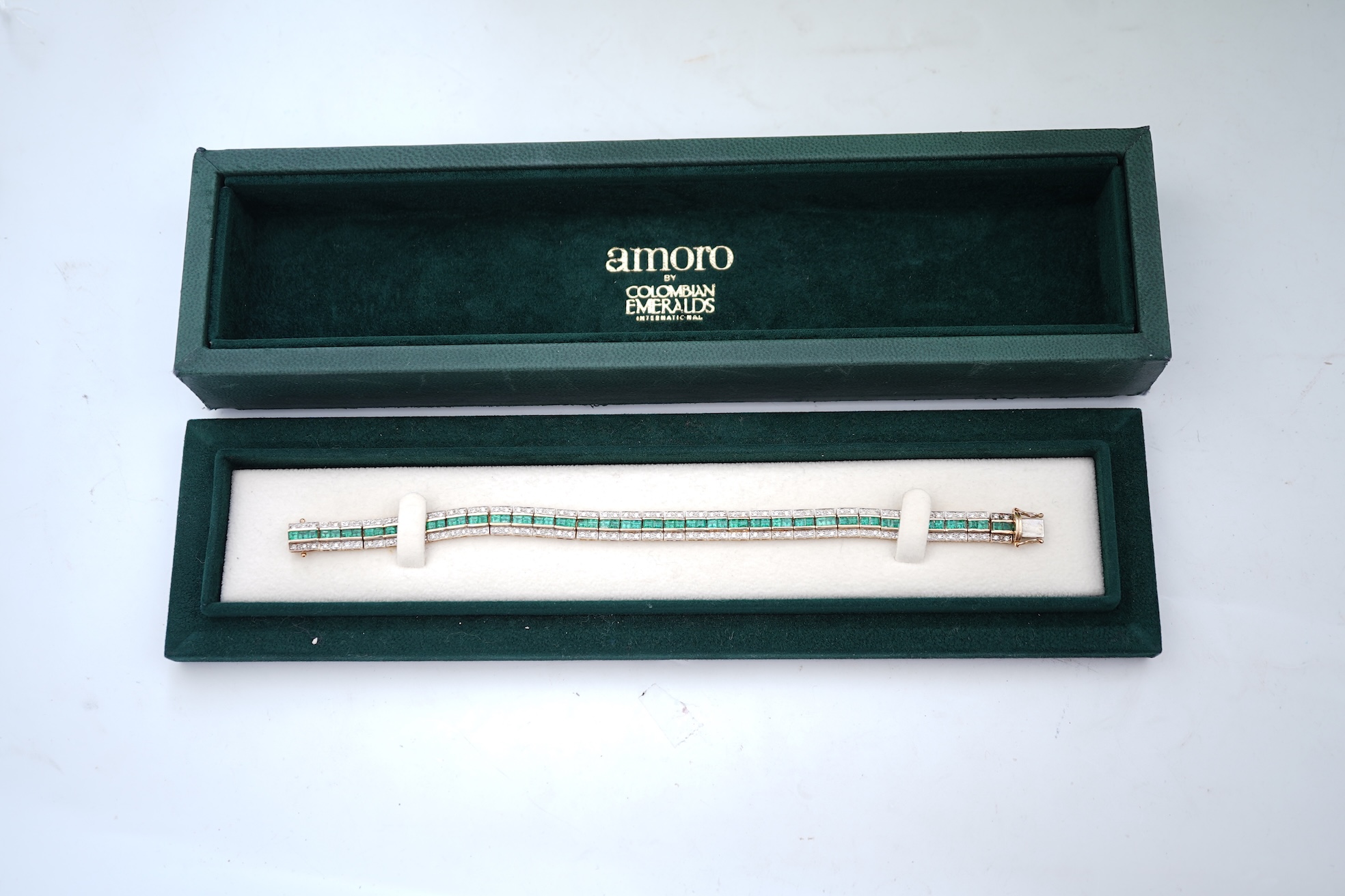 A lady's 2002 gilt steel Raymond Weil quartz wrist watch, with mother of pearl dial and simulated diamond dot numerals, with box and papers.